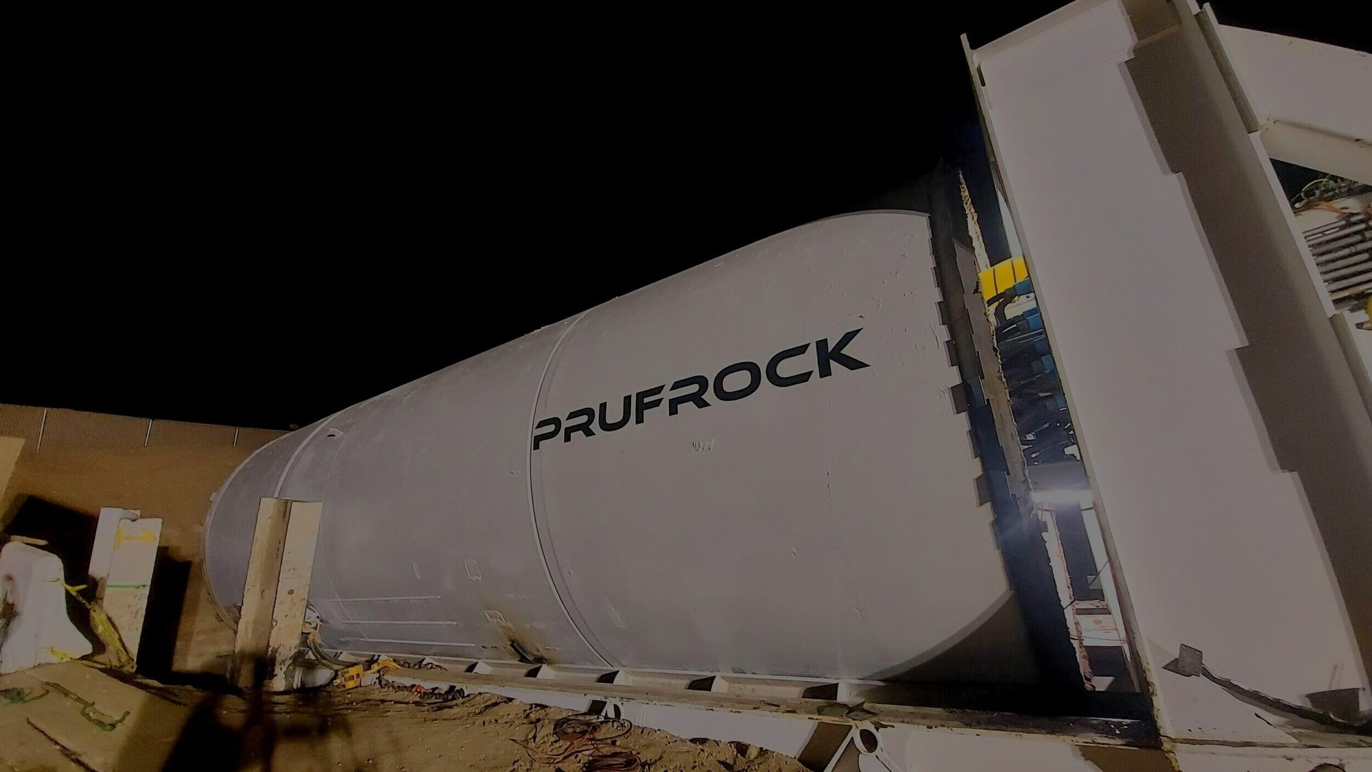 The Boring Company Prufrock tunnel boring machine at night