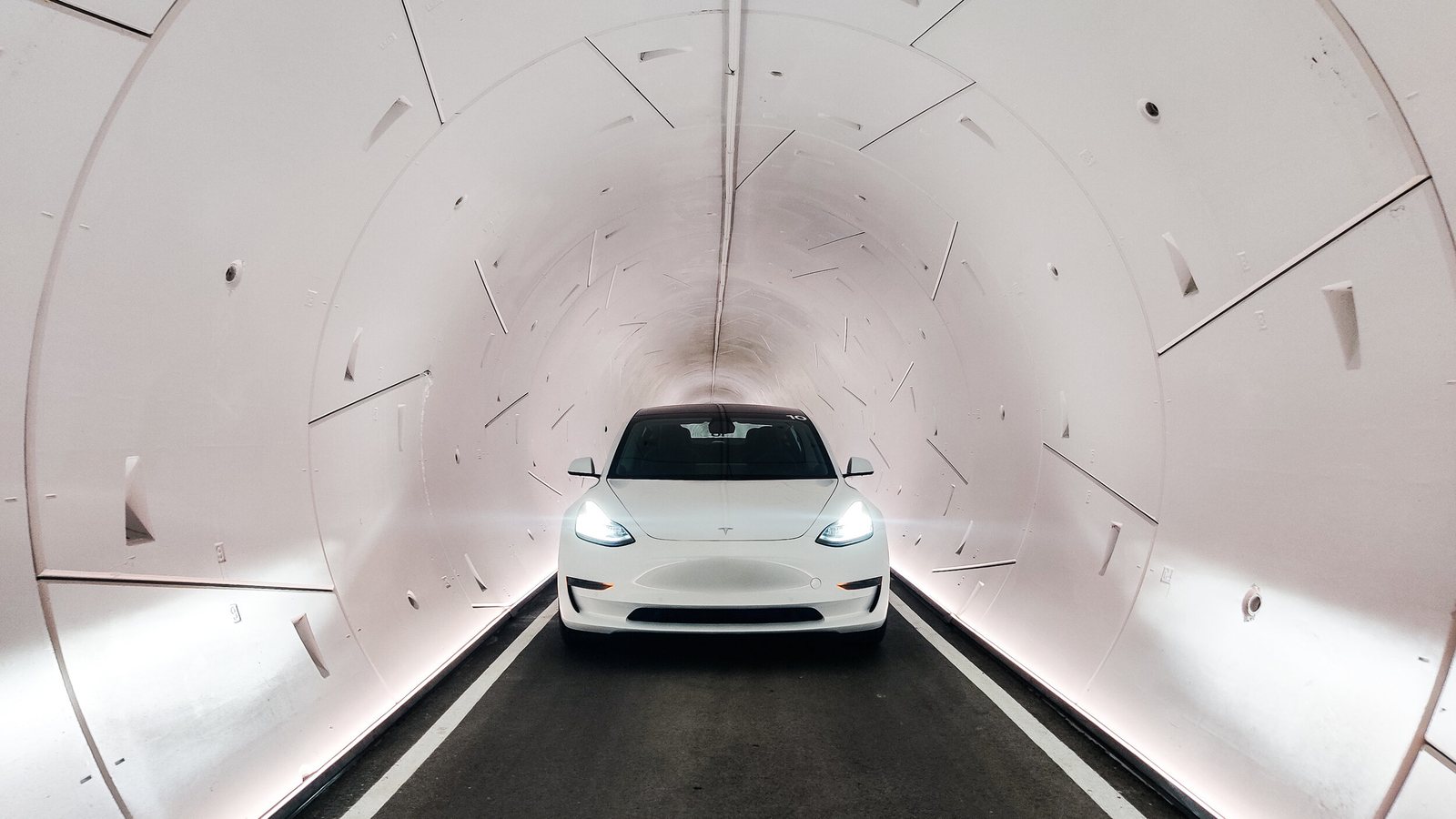 White Tesla Model 3 inside a finished Vegas Loop tunnel