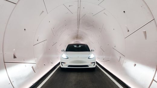 White Tesla Model 3 inside a finished Vegas Loop tunnel