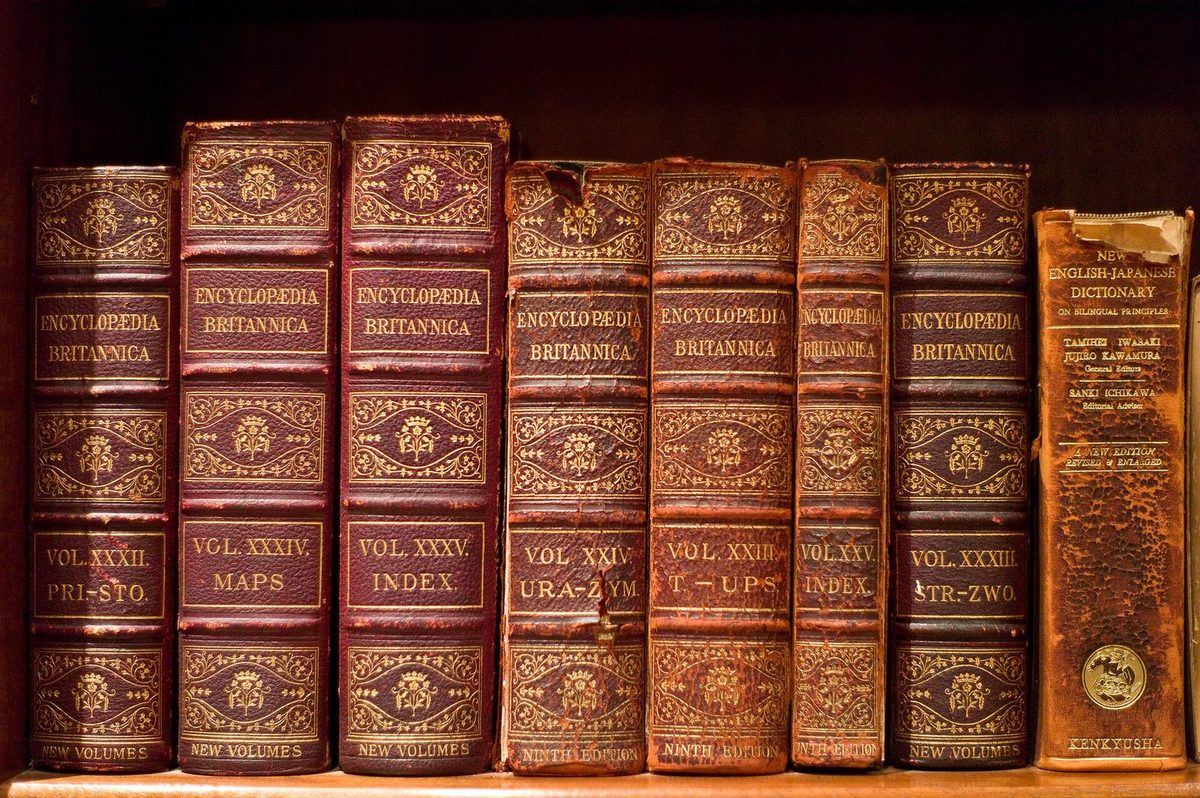 Leather-bound volumes of the Encyclopædia Britannica on a shelf