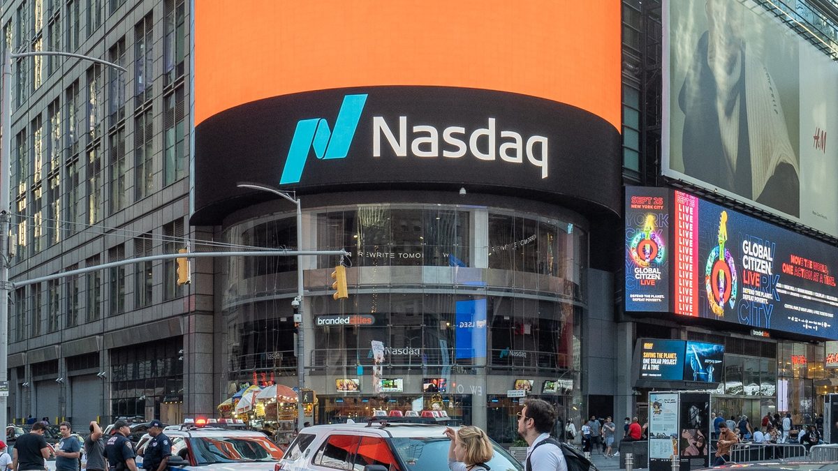 The Nasdaq sign on the MarketSite tower above the street in Times Square, New York