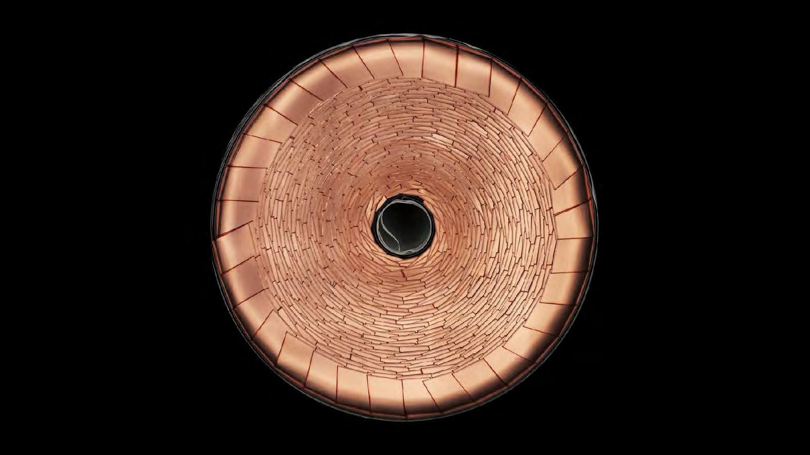 Top-down view of the tabless copper electrode spiral inside a Tesla 4680 cell