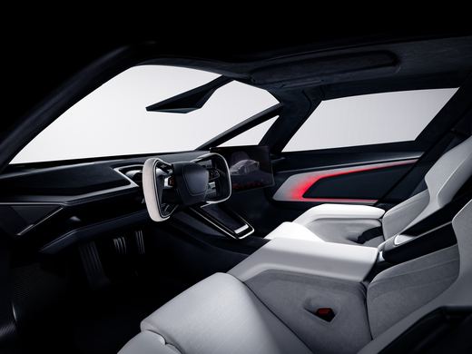 Driver's side of the 2026 Tesla Roadster cabin with a white yoke and small displays